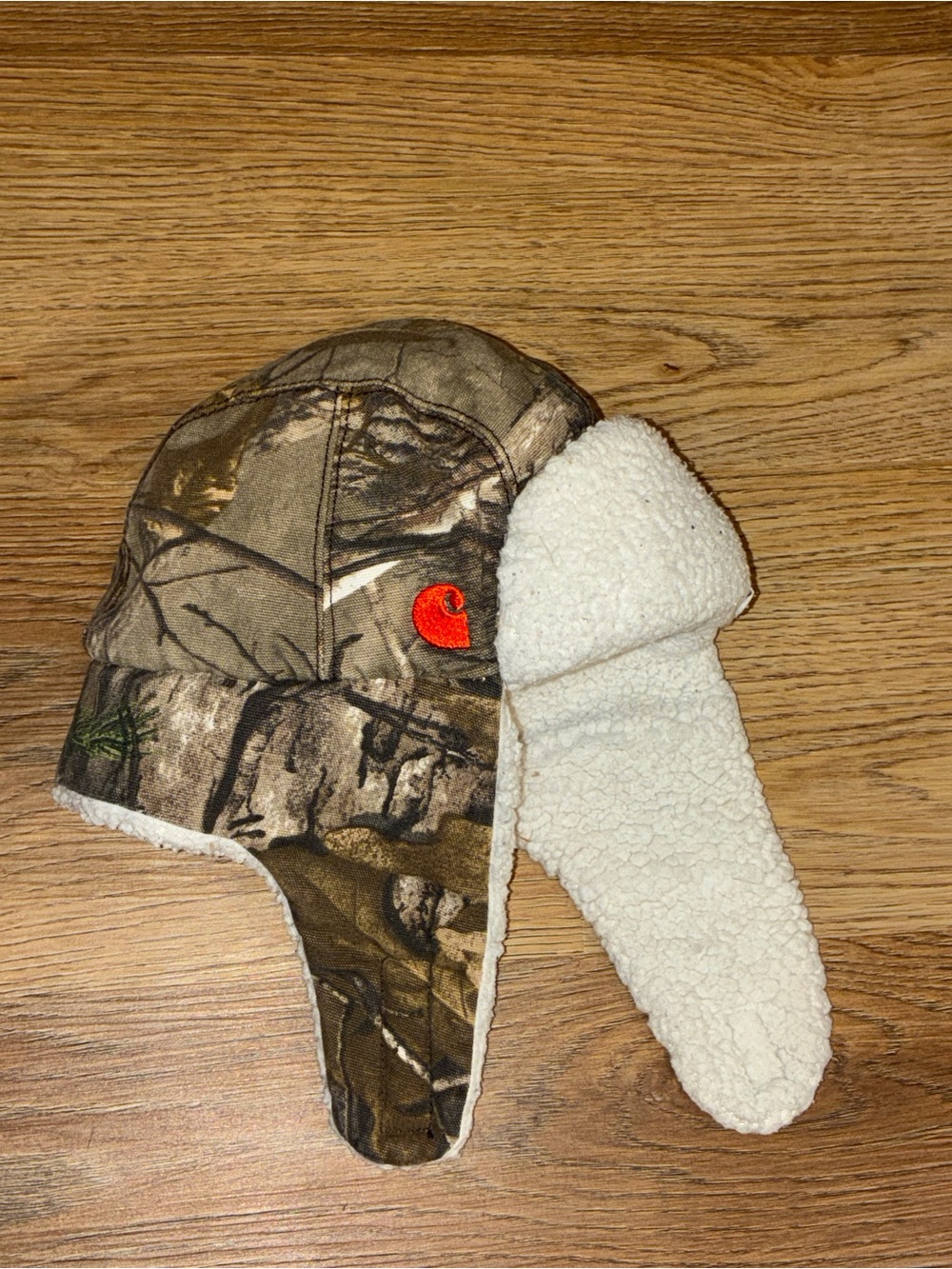 Carhartt Kids Camo Trapper Hat with White Sherpa Lining and Orange Logo